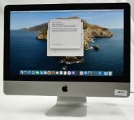 1 x Apple iMac 21.5 Inch Desktop Computer - Features an Intel Core Quad Core 2.7Ghz Processor, 8GB