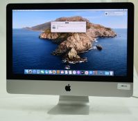 1 x Apple iMac 21.5 Inch Desktop Computer - Features an Intel Core Quad Core 2.7Ghz Processor, 8GB