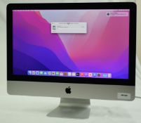 1 x Apple iMac 21.5 Inch Desktop Computer - Features an Intel Core Quad Core 2.8Ghz Processor, 8GB