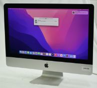 1 x Apple iMac 21.5 Inch Desktop Computer - Features an Intel Core Quad Core 2.8Ghz Processor, 8GB