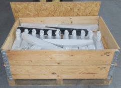Aprox 36 x Duralock Mobile Barrier Feet including Ballast Weights and a Flexi Crate Pallet