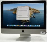 1 x Apple iMac 21.5 Inch Desktop Computer - Features an Intel Core Quad Core 2.7Ghz Processor, 8GB