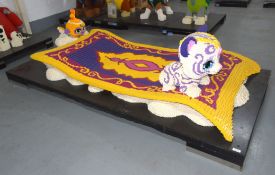1 x Large 8x4ft Plastic Brick Sculpture of Two Cartoon Style Characters Flying on a Magic Carpet