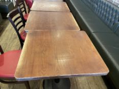 6 x Restaurant Dining Tables Featuring Stained Wooden Tops and Black Pedestal Bases
