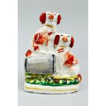 Miniature Staffordshire flatback model of two spaniels and a barrel, second half C19th
