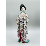 Japanese Arita figure of a Bijin, second half C19th