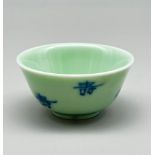 Chinese celadon glaze sake cup with shou symbols, Qing dynasty (1644-1912)
