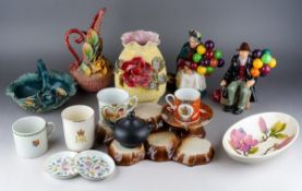 An early 20th Century Royal Doulton The Old Balloon Seller HN1315 and The Balloon Man HN1934,