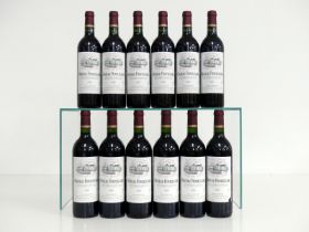 12 bts Ch. Fonplégade 2000 owc St-Émilion 1er Grand Cru hf/i.n, 1 vsl torn label