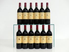 12 bs Clos du Marquis 1999 owc St-Julien 5 hf, 5 i.n, 2 vts, 1 sl stl, vsl foil damage