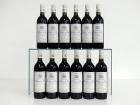 12 bts Ch. Rollan de By 1995 owc Médoc Cru Bourgeois 7 hf/i.n, 5 i.n