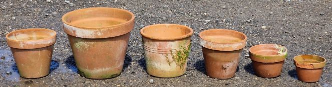 Six terracotta pots of various size and design, largest H 36cm x W 44cm (6)