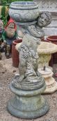Henri studios - Reconstituted stone garden statue of a cherub on plinth holding a planter, H 101cm x