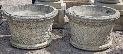 Haddonstone - Pair of weathered reconstituted stone garden planters with repeating floral relief and
