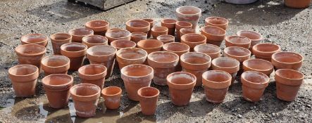 Forty eight small terracotta pots of various size and design (48)