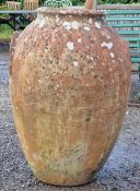 Weathered terracotta olive jar, H 84cm x W 55cm