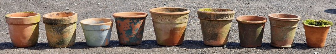 Nine terracotta planters of various size and design, largest H 34cm x W 35cm (9)