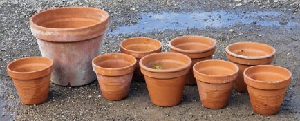 Nine terracotta pots of various size and design, largest H 41cm x W 48cm (9)