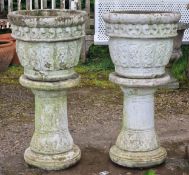 Pair of reconstituted stone garden planters with foliate detail and distressed paintwork, raised