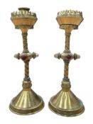 Contents of a Moreton-in-Marsh mansion - Pair of ecclesiastical brass candlesticks with coloured