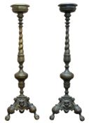Pair of Baroque style bronze altar torcheres / candlesticks with barley twist columns and cherub