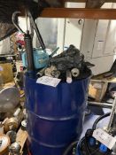 Drum of oil and pump