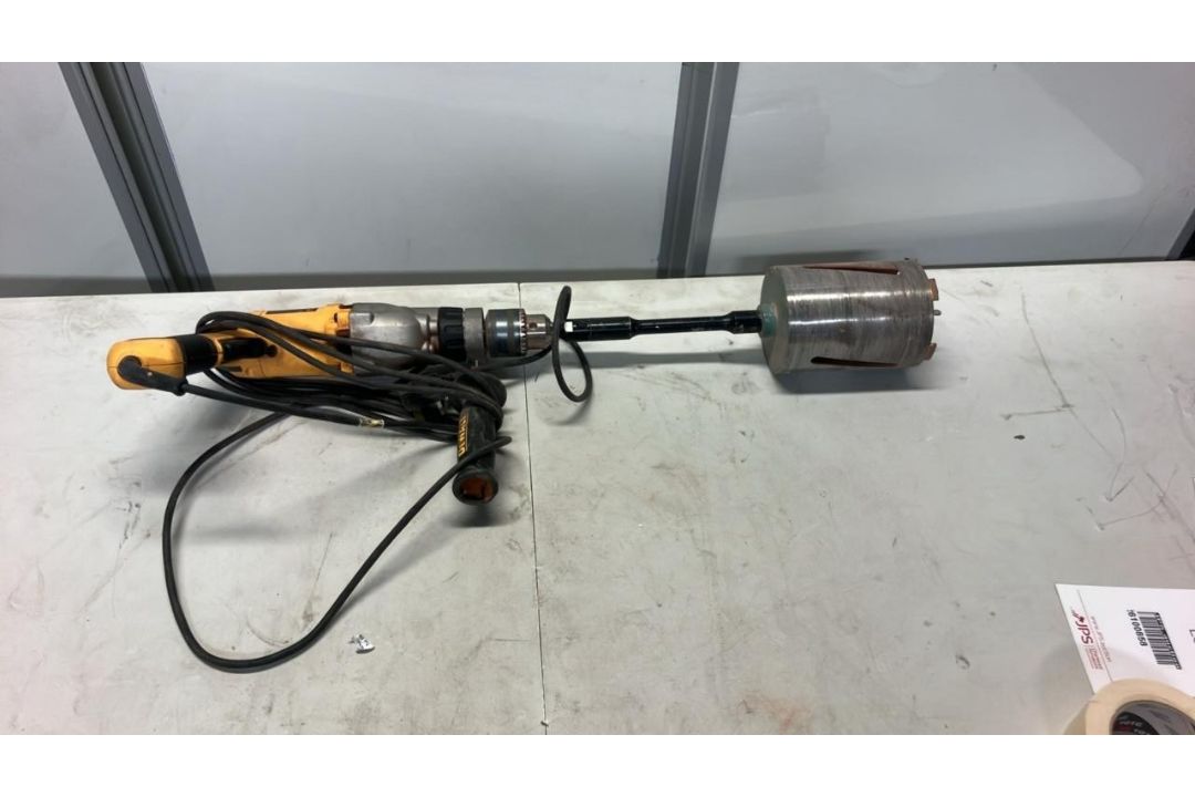 DEWALT D21570-GB 1300W Corded Percussion Drill with Core Bit, 16mm Chuck, 2-Speed Gearbox - Image 1 of 3