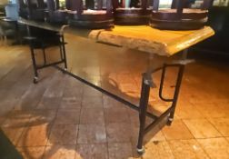 Adjustable bar height tables with wooden top