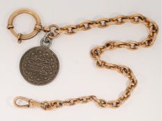 Taschenuhrenkette: antike Uhrenkette mit arabischer Münze, um 1900
