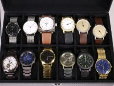 Armbanduhr: Konvolut moderne Herrenuhren in Sammler-Box, diverse Marken