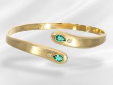 Bangle: open, handcrafted designer bangle in 18K gold with emeralds and brilliant-cut diamonds
