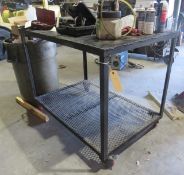 steel shop table on casters with mesh bottom shelf 49" x 32" x 38" high
