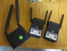 Inseego router and two other in hand routers