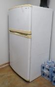 Kenmore white refrigerator in breakroom working but rough