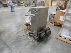 steam boiler on stand with parts to hook up