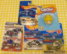 blister packed Hot Wheels and Grow Creature Croissant