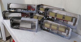 Long Hauler 1:32 scale die cast (5) flat bed trailer, (2)Peterbilt tractor trailer rigs