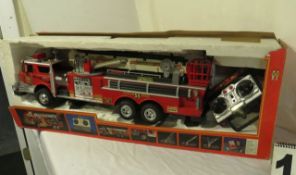 New Bright radio control 9.6v fire engine in box (box rough)