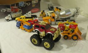 group of 16 unboxed die cast trucks