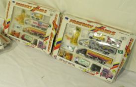 sets of 8 die cast metal construction trucks, race cars,
