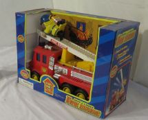 toy fire truck with man on ladder