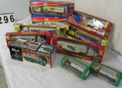 assorted tractor trailer models and Mack transport series 210 plus bonus (2) mini Hess trucks