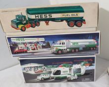 vintage mixed Hess toy trucks - Early tanker semi, later model tanker semi with lights and horn, ...