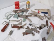 assorted drawing tools, desk supplies, soldering wire, can openers, padlock