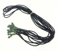 An aventurine quartz and black paste bead scarf style necklace