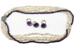 A freshwater cultured pearl and amethyst necklace with three amethyst buttons