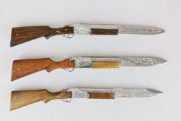 Drei Brieföffner in Gewehrform