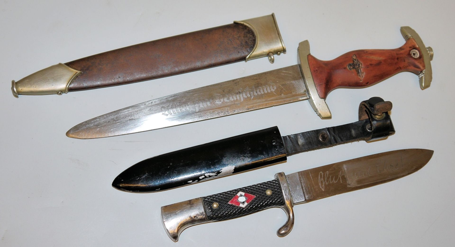 HJ-Fahrtenmesser RZM M7/60 und SA-Dolch Pommern