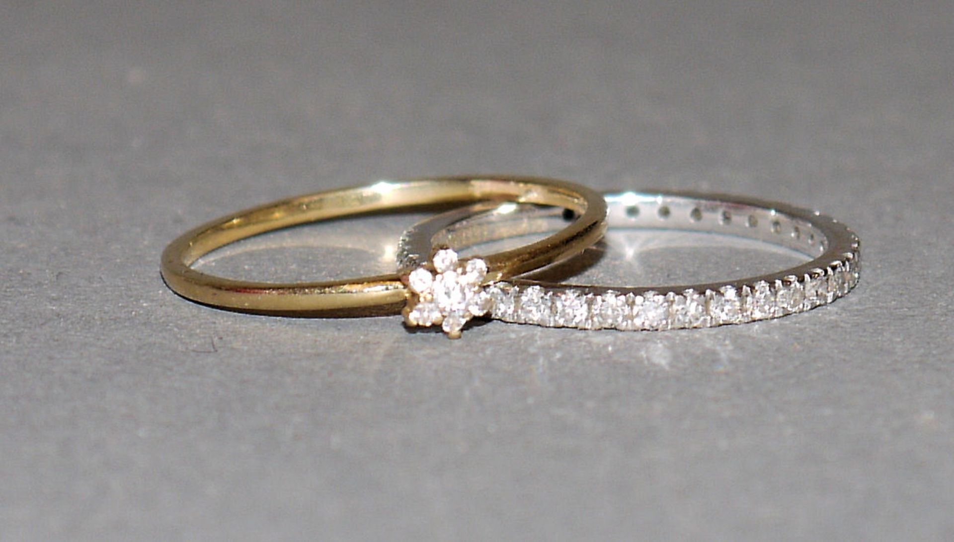 Zwei Brillantringe, Gold, Premier u.a.