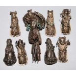 Acht figürliche Hutornamente aus Silber der Qing-Zeit, China 18./19. Jh.